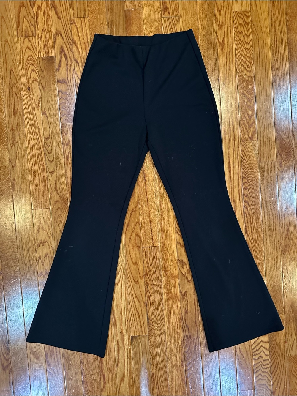 H&M black pull on flare leg dress pants women’s size medium EUC